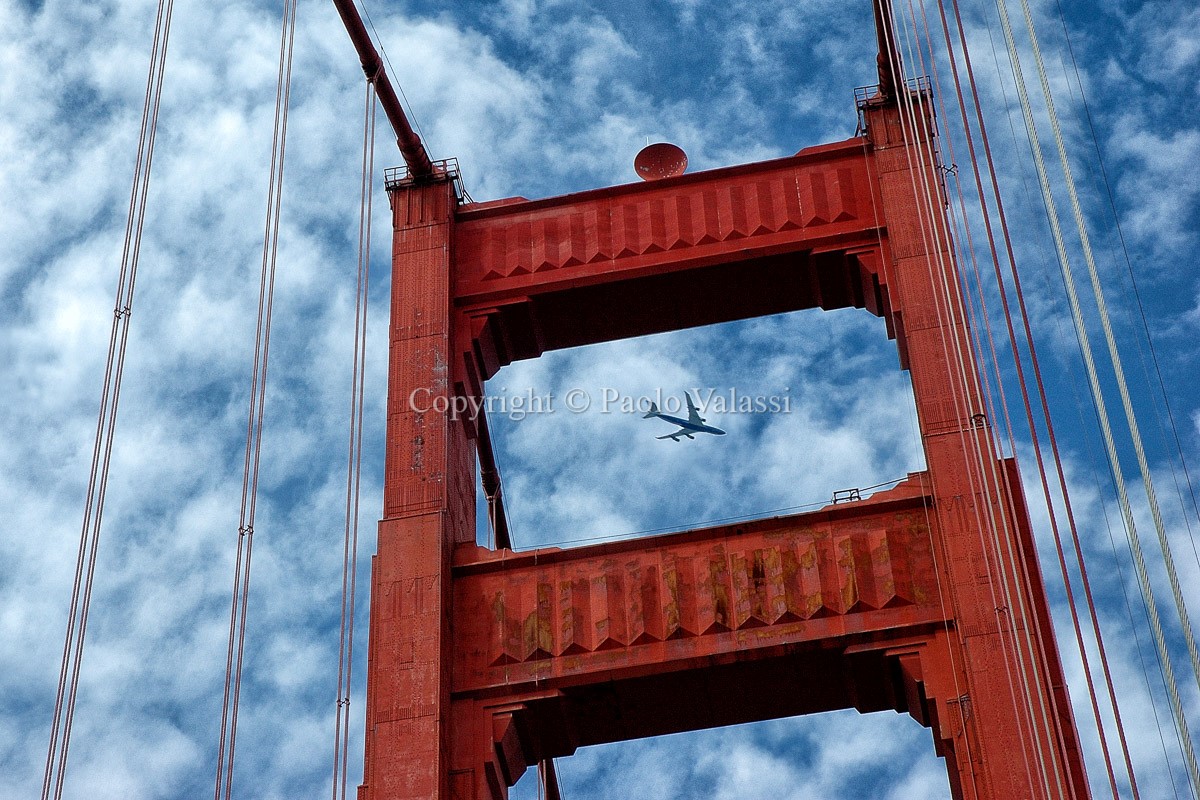 San Francisco  - Airplane through the Golden Gate Bridge arch